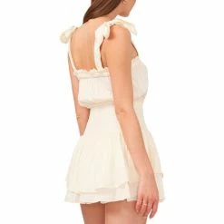 Wholesale 👏 Chelsea & Violet Square Neck Sleeveless Tie Shoulder Smocked Mini Ruffle Satin Romper Toasted Ivory 😉 -Chelsea & Violet Sales unnamed file 1156